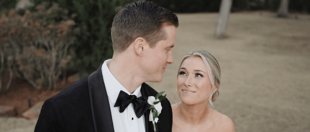 Close-up of a bride gazing lovingly at her groom after their wedding, capturing her expression and emotion.